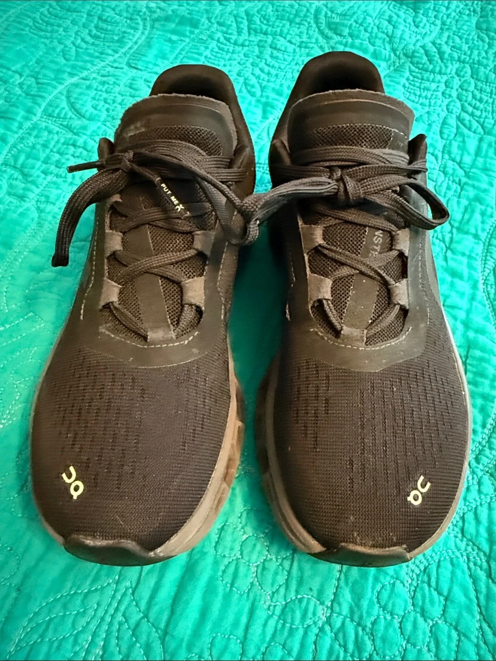 On Running Women’s Black Athletic Sneakers with Gray Sole Accents